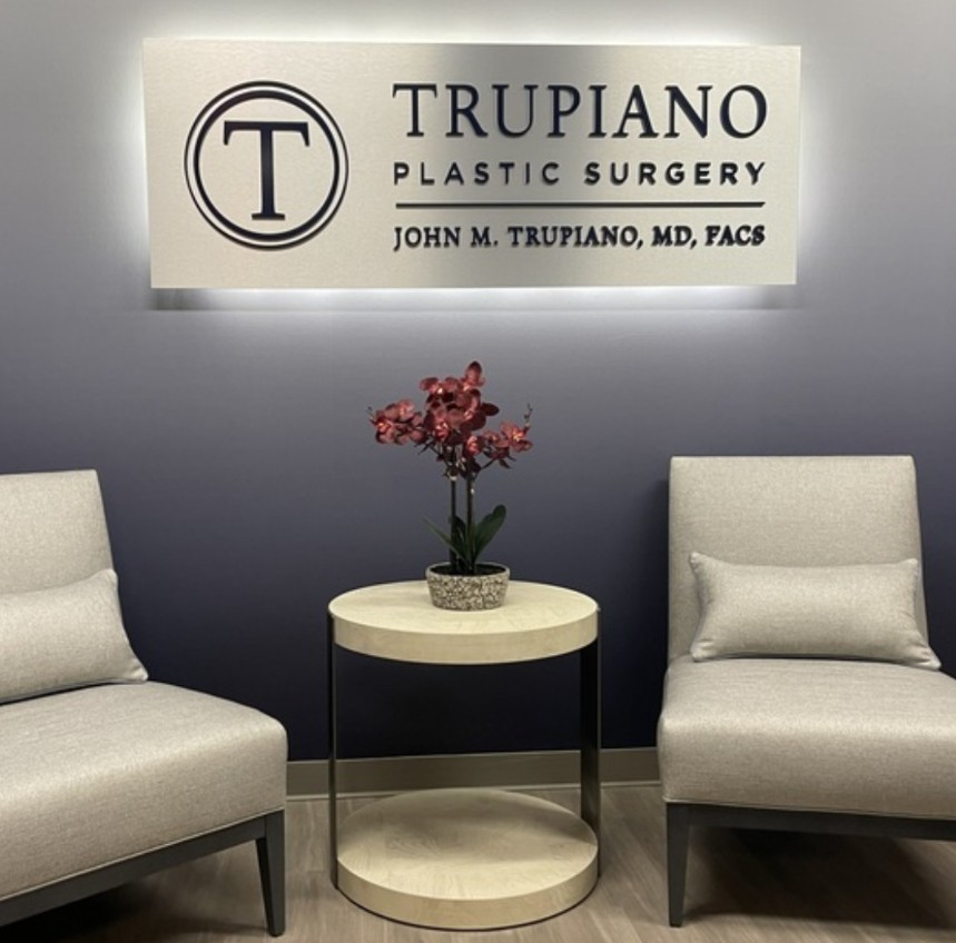 wall logo sign at Trupiano Plastic Surgery